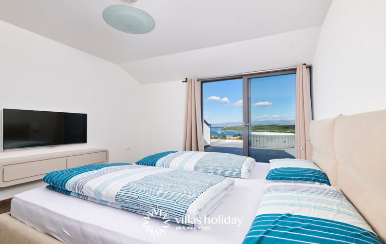 Upper floor bedroom of Villa Blue Ocean