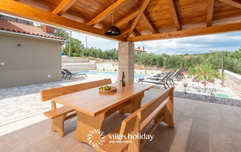 Outdoor dining area of Casa San Vital