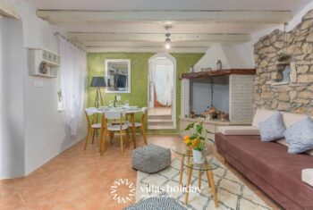 Living room and dining area of Casa Dvi Mendule