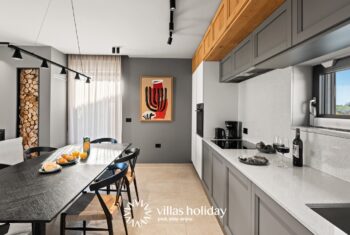 Kitchen dining area and living room of Villa San Vincenti