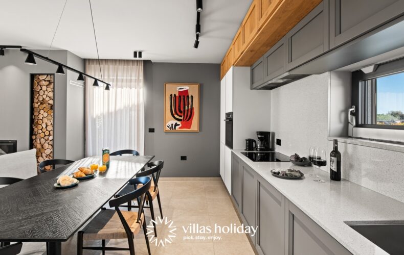 Kitchen dining area and living room of Villa San Vincenti