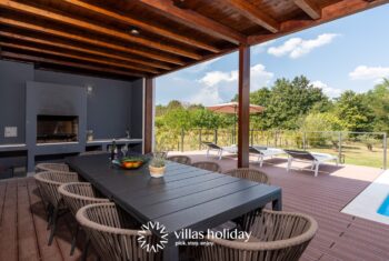 Grill area and outdoor dining table of Villa Istria Green